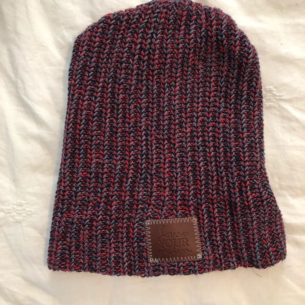 Love Your Melon beanie in red, blue and grey